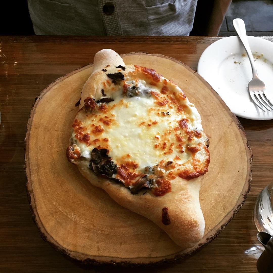 cheese boat Adjaruli Khachapuri New York Essential Dish