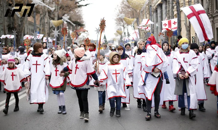 Tbilisi, Georgia. 7th Jan, 2016. Georgian people march during Alilo, a  religious procession, to celebrate the Orthodox Christmas in Tbilisi,  capital of Georgia, on Jan. 7, 2016. Georgians celebrate Christmas on Jan.